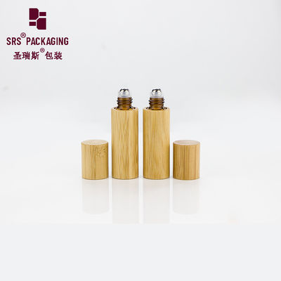 Buy 5ml mini organic natural essential oil empty glass bottle bamboo cap online manufacture